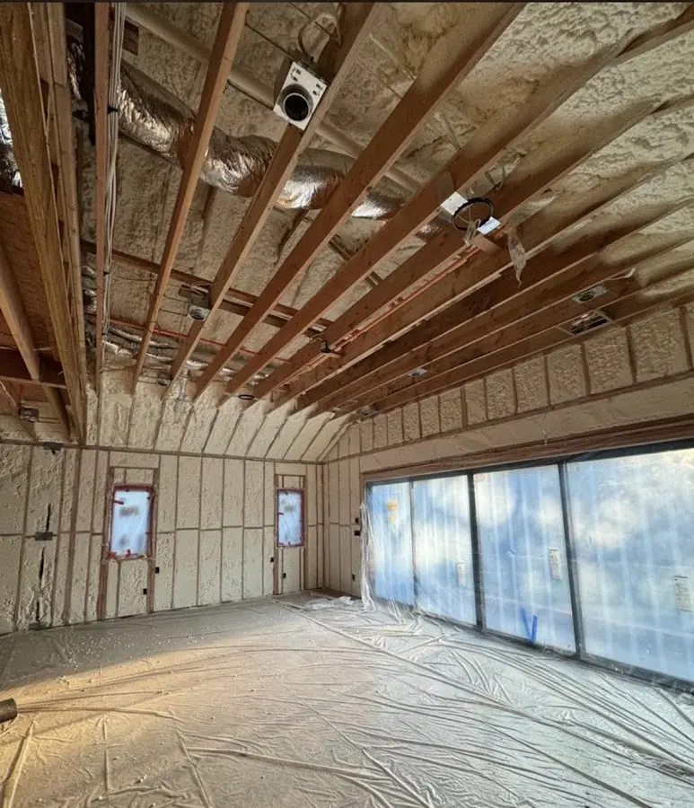 Interior walls and ceiling insulated with spray foam during new construction in Belton